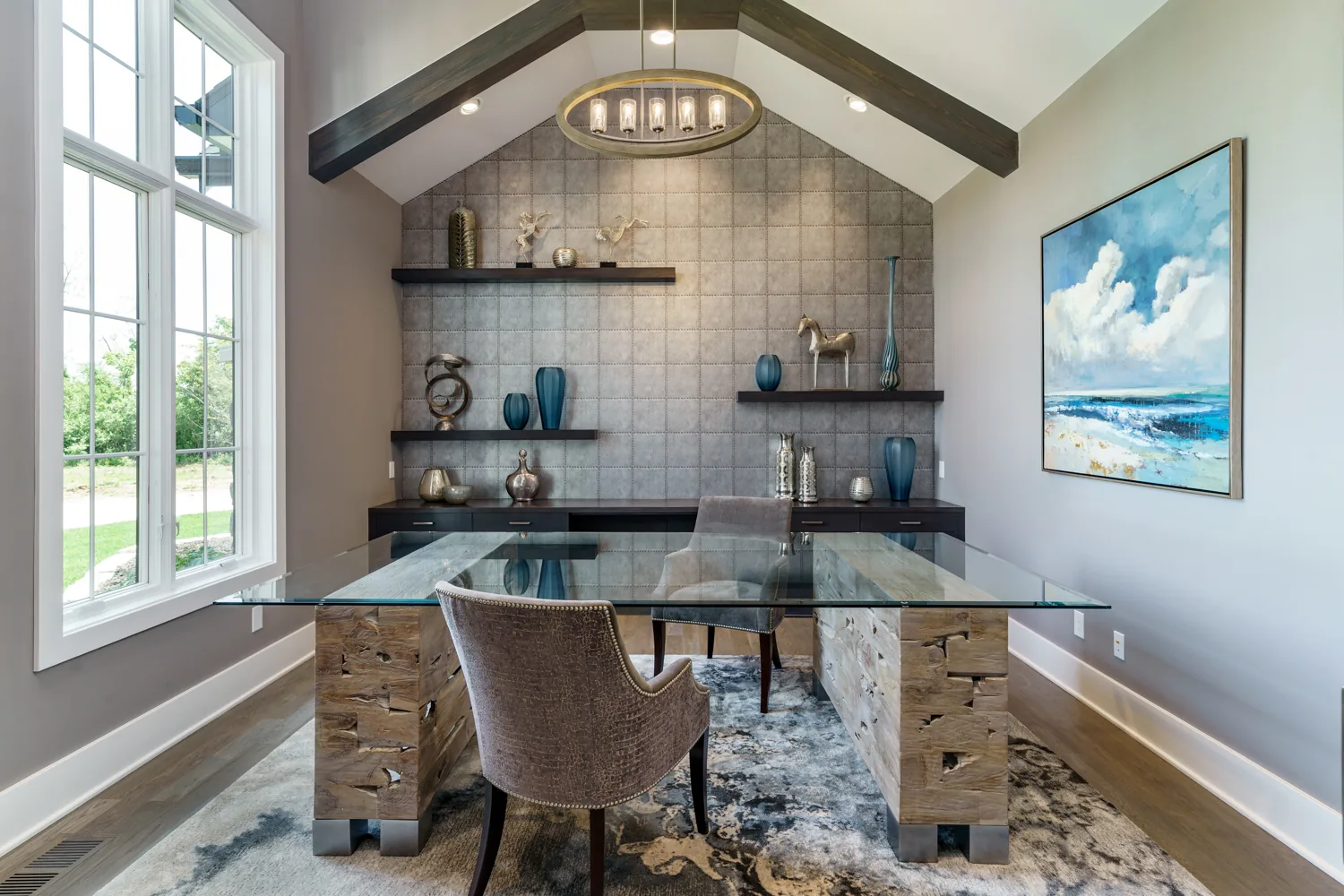 Dining room with vaulted ceiling and black beams