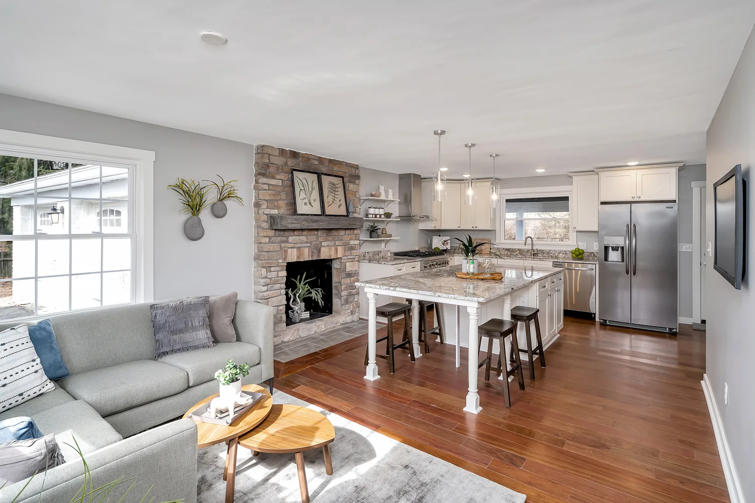 Open plan living and dining room with soft natural light